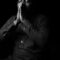 grayscale photo of man wearing dress shirt